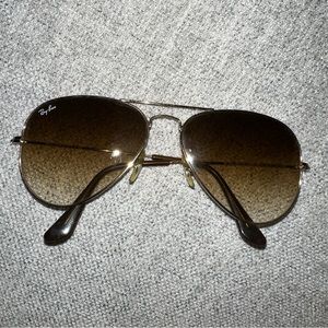 Ray Bans Aviators 
AVIATOR GRADIENT- POLISHED GOLD FRAME WITH LIGHT BROWN LENSES